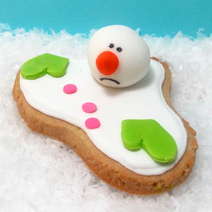 the ORIGINAL melting snowman cookie - the very first version of the now-traditional Christmas cookie created by TheDecoratedCookie.com #meltedsnowmancookies 