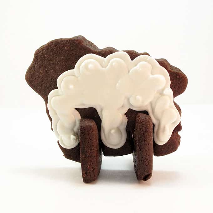 Lamb cookies: How to make 3D standing lamb cookies for Easter with chocolate cut-out cookie dough and delicious royal icing.