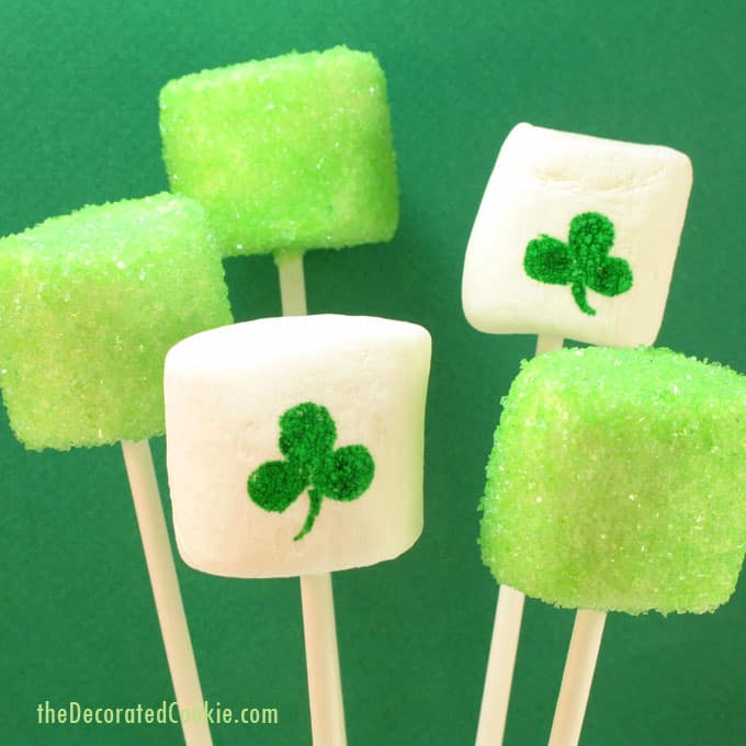 Fun food idea for St. Patrick's Day: St. Patrick's Day marshmallows with sprinkles and food coloring pens - by TheDecoratedCookie.com -- #StPatricksDay #StPatricksDayParty #StPatricksDayFoodIdeas #marshmallows #GreenFood 