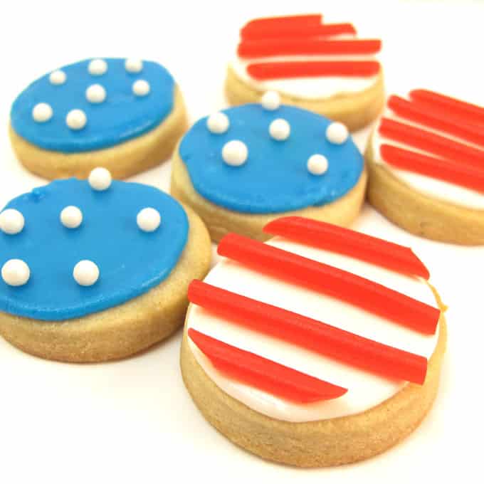 Stars and stripes cookies -- How to decorate bite-size 4th of July cookies with sprinkles and store-bought candy.  #4thofJuly #DecoratedCookies #4thOfJulyCookies #StarsandStripes #AmericanFlag