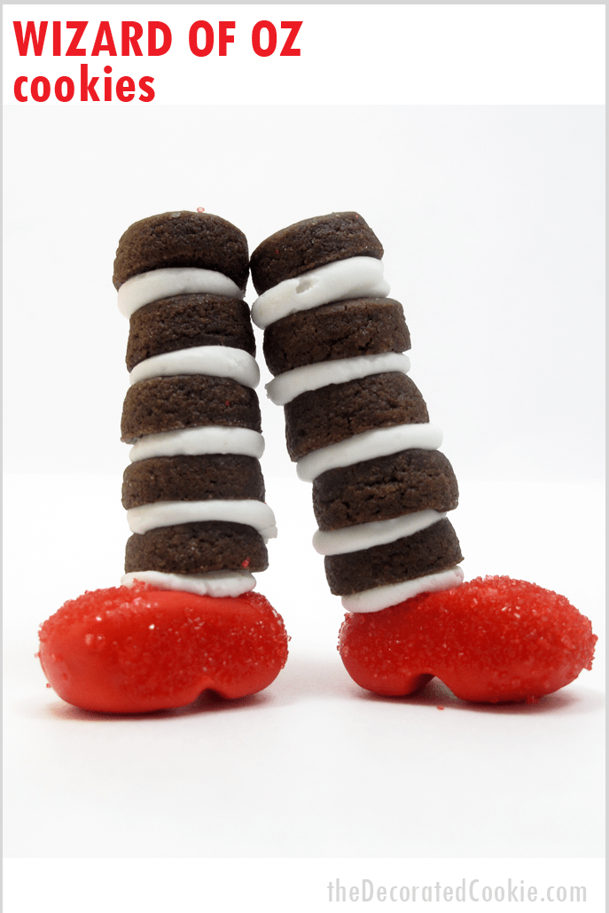 Wizard of Oz cookies: Mini chocolate cookies with fondant ruby slippers to look like the witch's legs from the Wizard of Oz #WizardOfOz #Cookies #WickedWitch #Halloween 