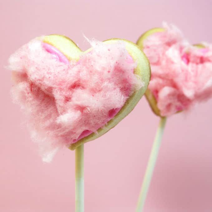 cotton candy heart cookie pops for Valentine's Day -- the decorated cookie #ValentinesDay #heartcookies #cookiepops #cottoncandy