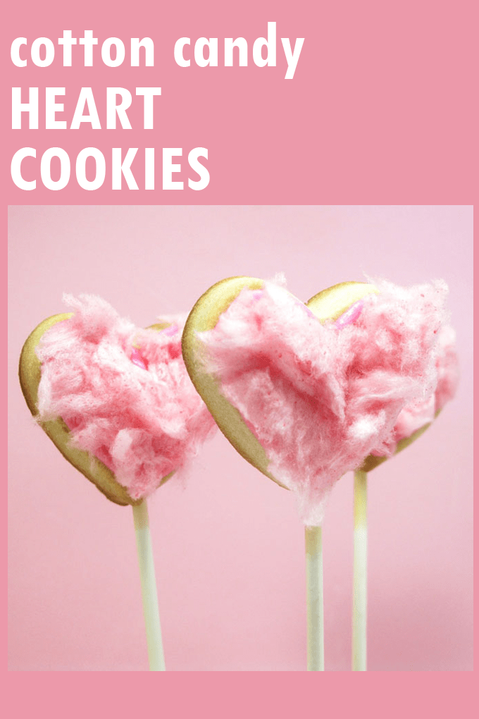 cotton candy heart cookie pops for Valentine's Day -- the decorated cookie #ValentinesDay #heartcookies #cookiepops #cottoncandy 