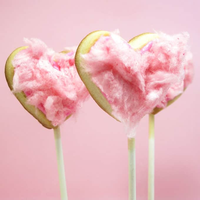 cotton candy heart cookie pops for Valentine's Day -- the decorated cookie #ValentinesDay #heartcookies #cookiepops #cottoncandy