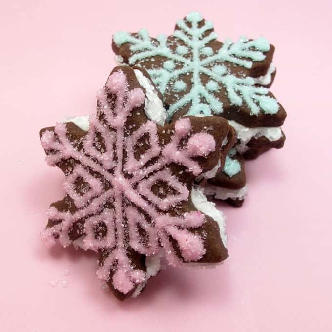 snowflake sandwich cookies for Christmas- the decorated cookie