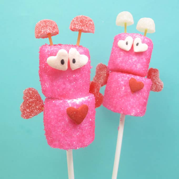  Cute marshmallow love bugs, candy treats for Valentine's Day by the decorated cookie. #lovebugs #ValentinesDay #Treats #marshmallows #Bugs 