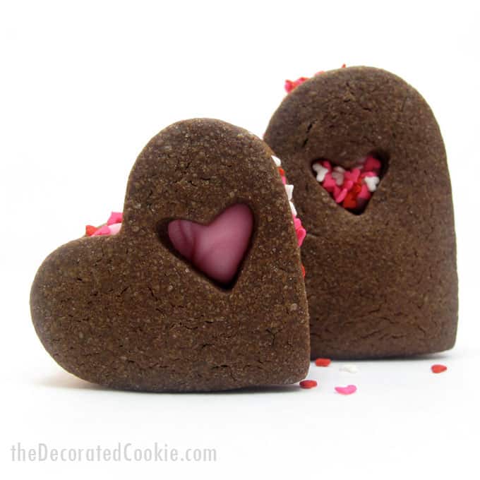 chocolate heart Valentine's Day sandwich cookies -- the Decorated Cookie #heartcookies #valentinesday #chocolatecookies #sandwichcookies #sprinkles 