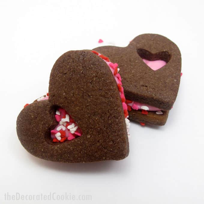 chocolate heart Valentine's Day sandwich cookies -- the Decorated Cookie #heartcookies #valentinesday #chocolatecookies #sandwichcookies #sprinkles 