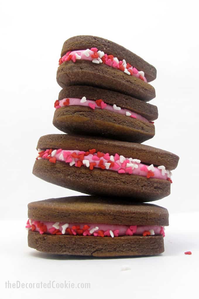 chocolate heart Valentine's Day sandwich cookies -- the Decorated Cookie #heartcookies #valentinesday #chocolatecookies #sandwichcookies #sprinkles 