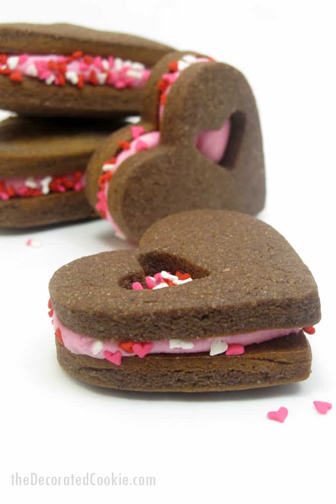 chocolate heart Valentine's Day sandwich cookies -- the Decorated Cookie #heartcookies #valentinesday #chocolatecookies #sandwichcookies #sprinkles 