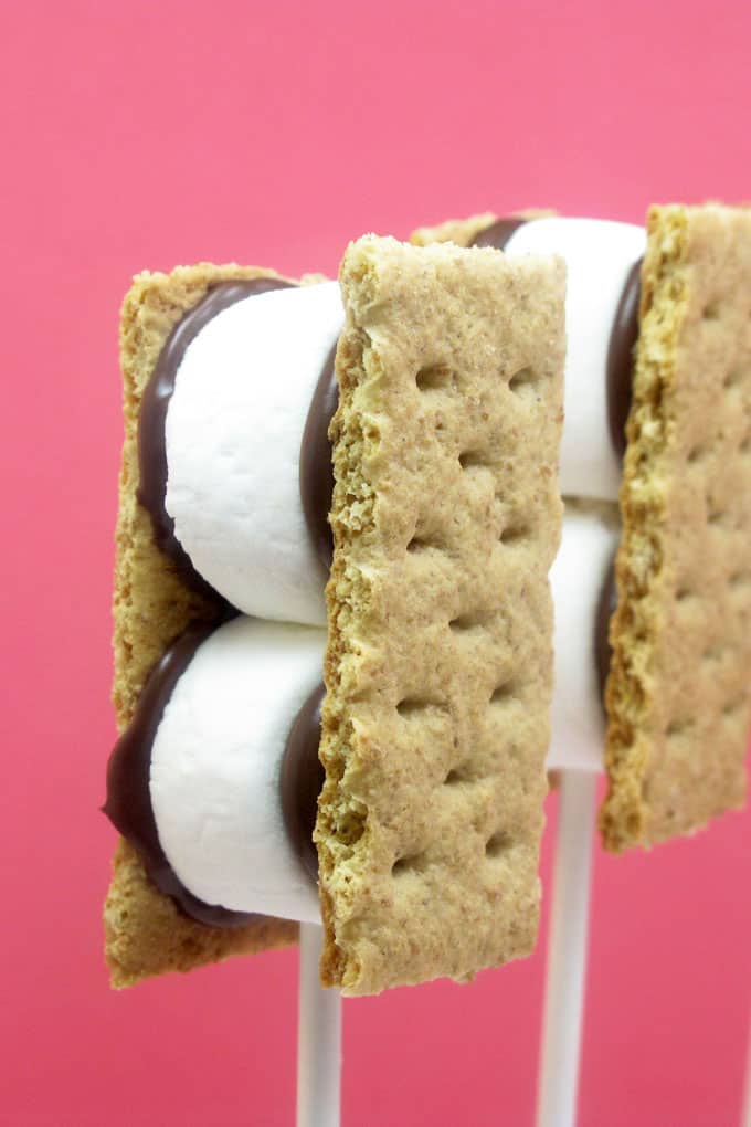 How to make s'mores on a stick, a fun twist on the classic summer treat. #smores #summerdesserts 