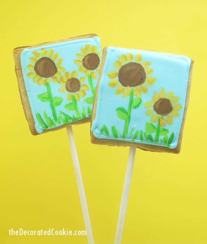 Painted sunflower cookies: How to paint on cookies with food coloring. 