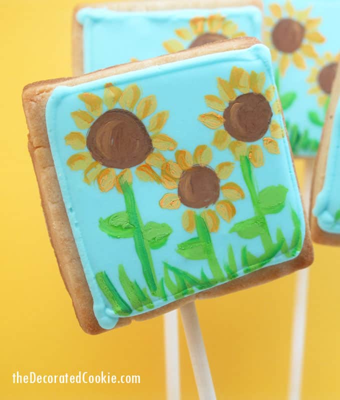 Painted sunflower cookies: How to paint on cookies with food coloring. 