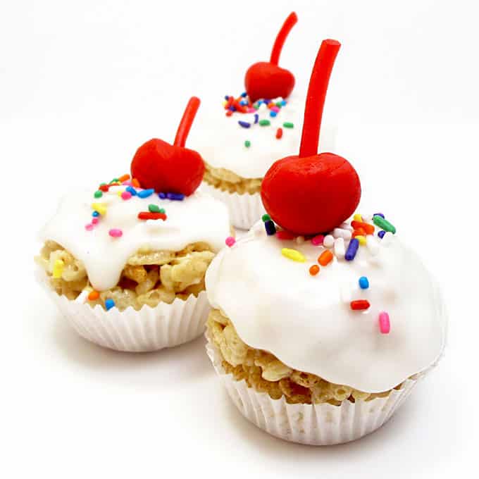 How to make cute, mini, frosted Rice Krispie Treat "cupcakes" with a fondant cherry on top. the decorated cookie