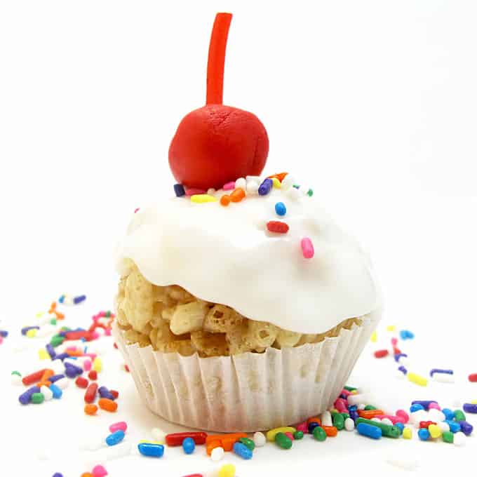 How to make cute, mini, frosted Rice Krispie Treat "cupcakes" with a fondant cherry on top. the decorated cookie