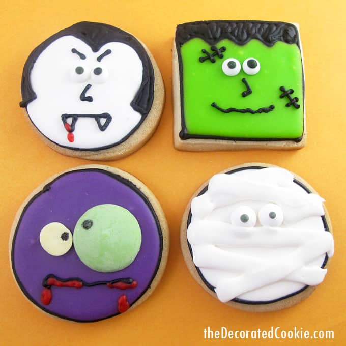 monster face cookies for Halloween -- Halloween dessert idea -- fun food for Halloween -- vampire, zombie, mummy, and Frankenstein cookies