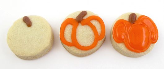 decorating pumpkin cookies 