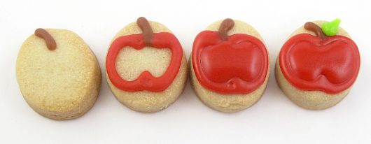 decorating mini apple cookies 