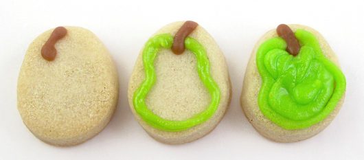 decorating mini pear cookies 