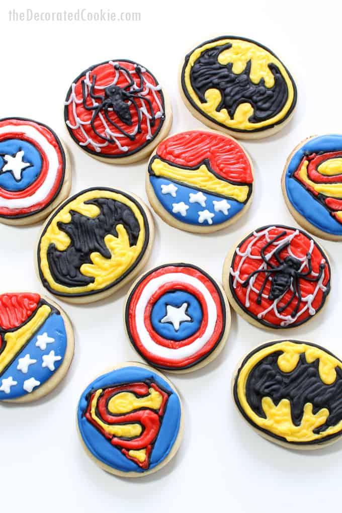 How to decorate bite-size superhero cookies for a superhero fan or a superhero birthday party. #SuperheroParty #SuperheroCookies #cookiedecorating 