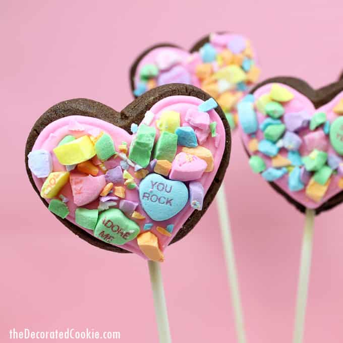 How to make crushed conversation heart cookies on a stick for Valentine's Day.  #ValentinesDaycookies #heartcookies #cookiepops #conversationhearts