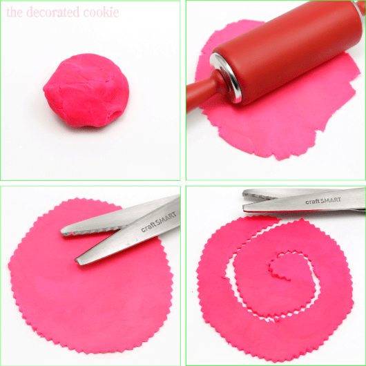 rolling out pink fondant 