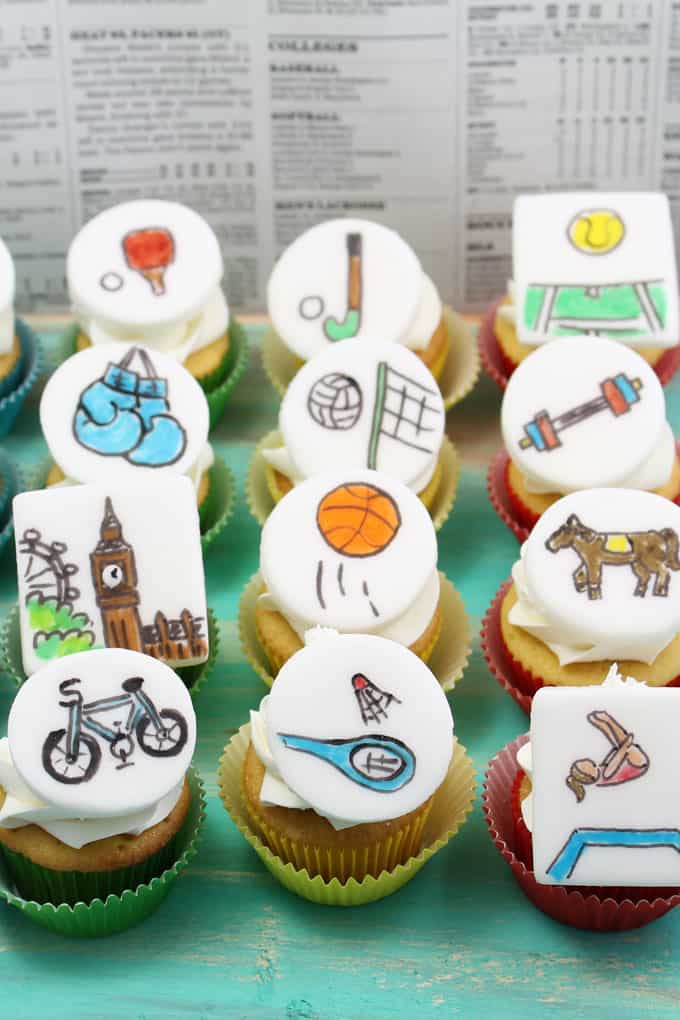 Olympics cupcakes Mini cupcakes with fondant toppers with every sport.