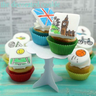 Olympics cupcakes: Mini cupcakes with fondant toppers with every sport.