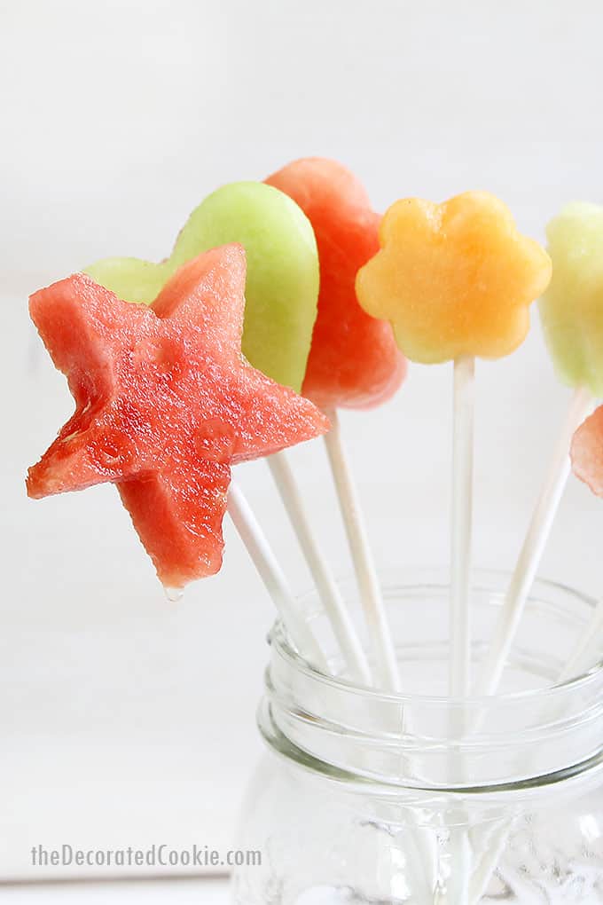 melon shapes on a stick in a jar 