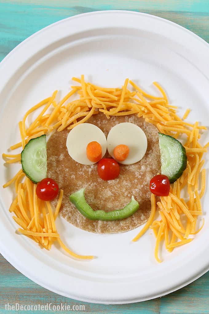 silly veggie faces with tortillas, cheese, and veggies 