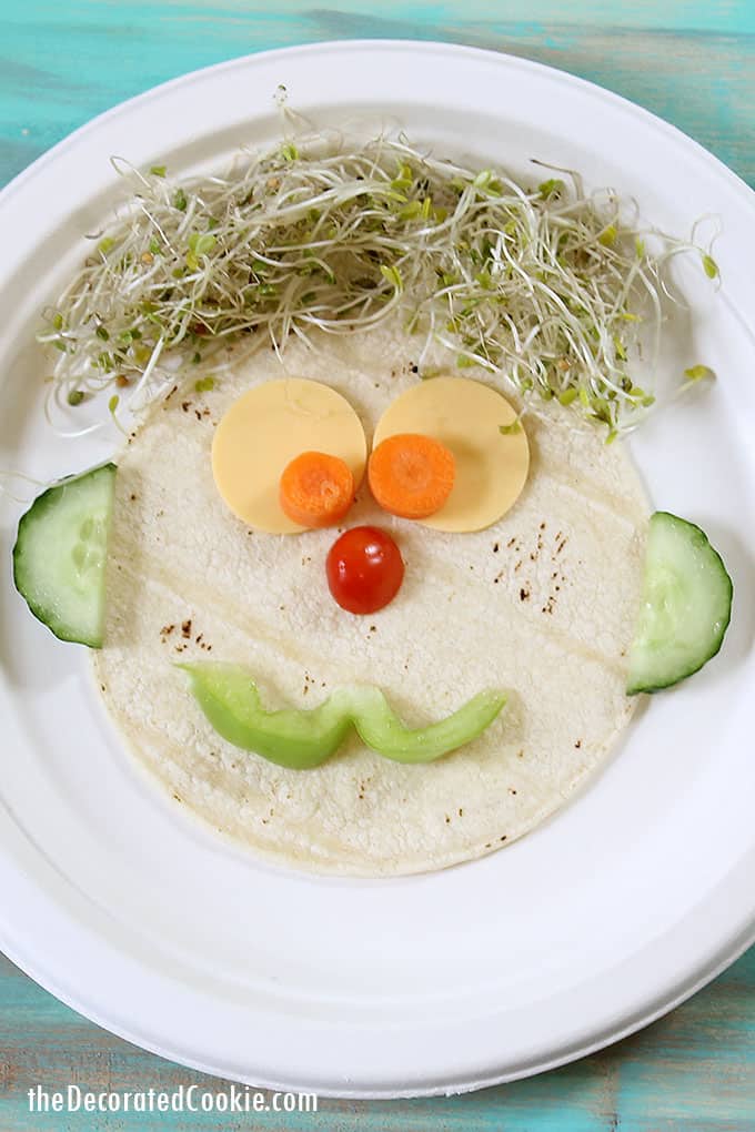 silly veggie faces with tortillas, cheese, and veggies