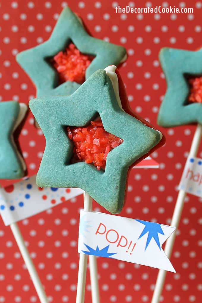 Pop Rocks star cookies, 4th of July sandwich cookies on sticks with red polka dot background