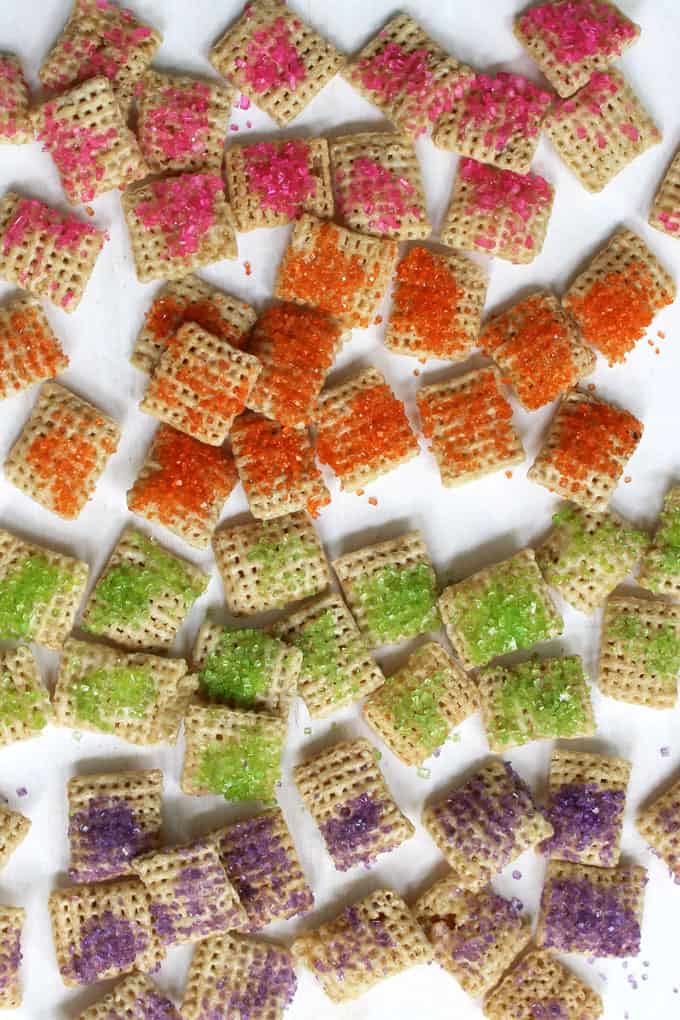RAINBOW CHEX MIX: Coat chex cereal with colorful rainbow sprinkles to make a fun party snack. Great unicorn food or rainbow party treat.