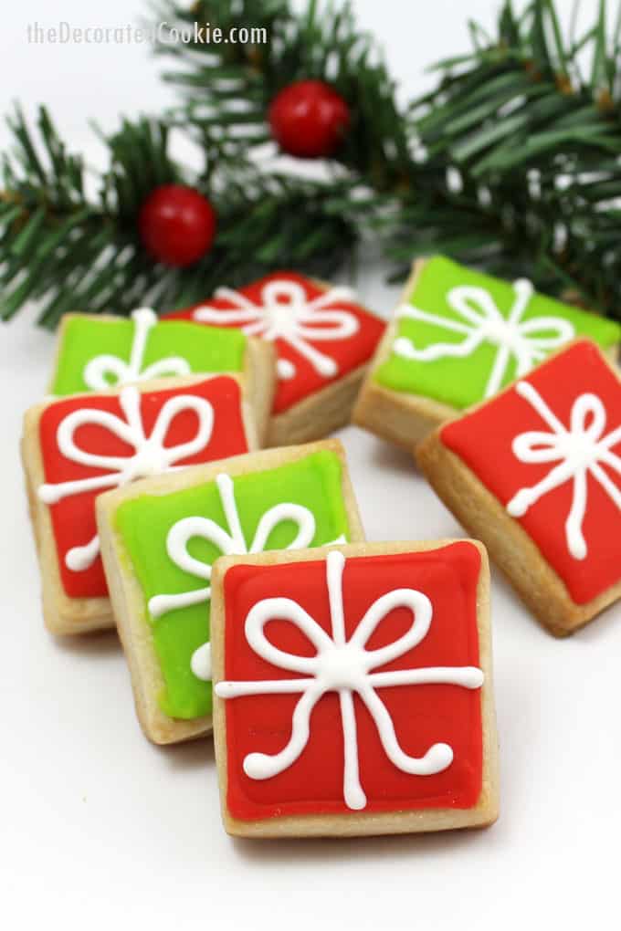 Step-by-step cookie decorating instructions to make bite-size Christmas present cookies. A simple, cute holiday cookie to give or serve at a holiday party