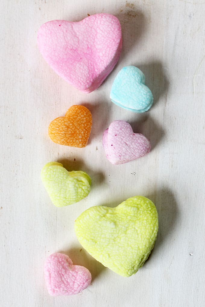 These dip-dyed pastel marshmallow hearts are a fun treat for Valentine's Day. They look just like the conversation candy.