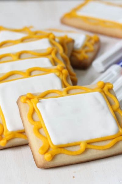 Decorate art canvas cookies and package with food coloring pens for art party favors. Kids design their own cookies.