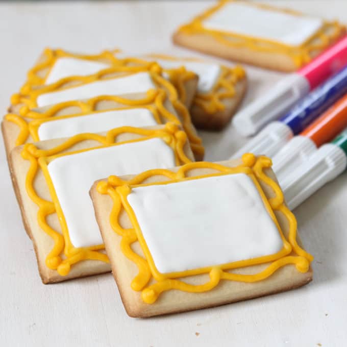  Decorate art canvas cookies and package with food coloring pens for art party favors. Kids design their own cookies.