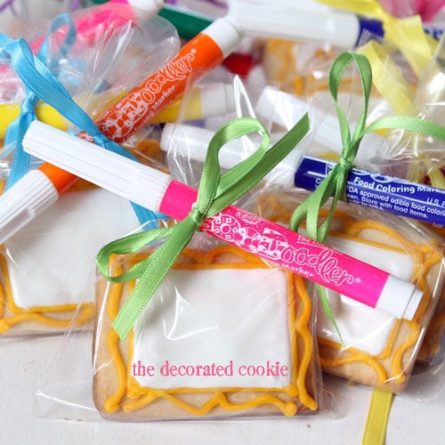 a kid's art party favors: canvas cookies with edible writers