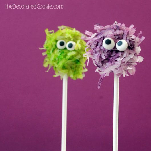 Fuzzy chocolate monsters pops combine coconut and chocolate on a stick, a cute and easy monster treat for your Halloween party food.