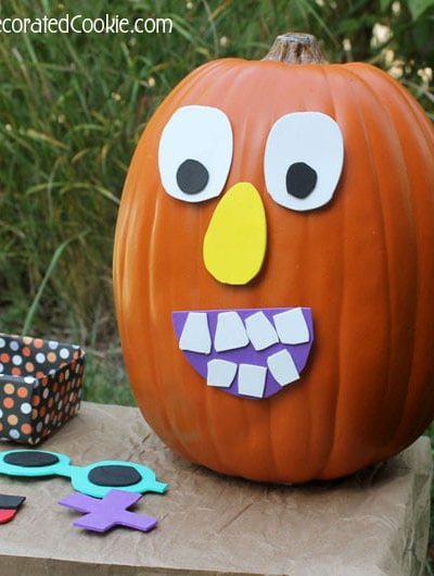 This "decorate me" Jack O' Lantern pumpkin face craft for kids is a fun and easy School Fall Fest activity. DIY Halloween game idea.