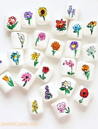 25 flowers drawn on marshmallows