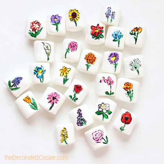 25 flowers drawn on marshmallows