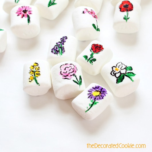 25 flowers drawn on marshmallows