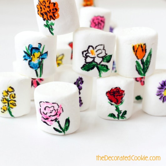 25 flowers drawn on marshmallows