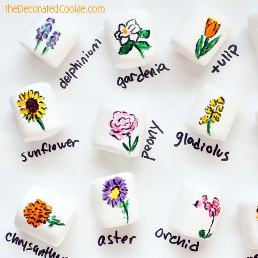 25 flowers drawn on marshmallows