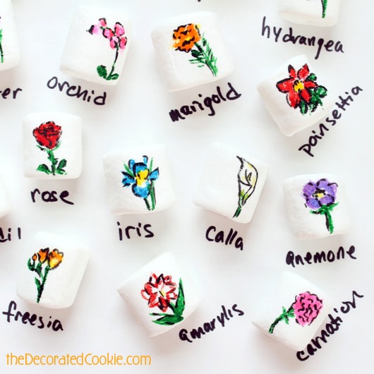 25 flowers drawn on marshmallows