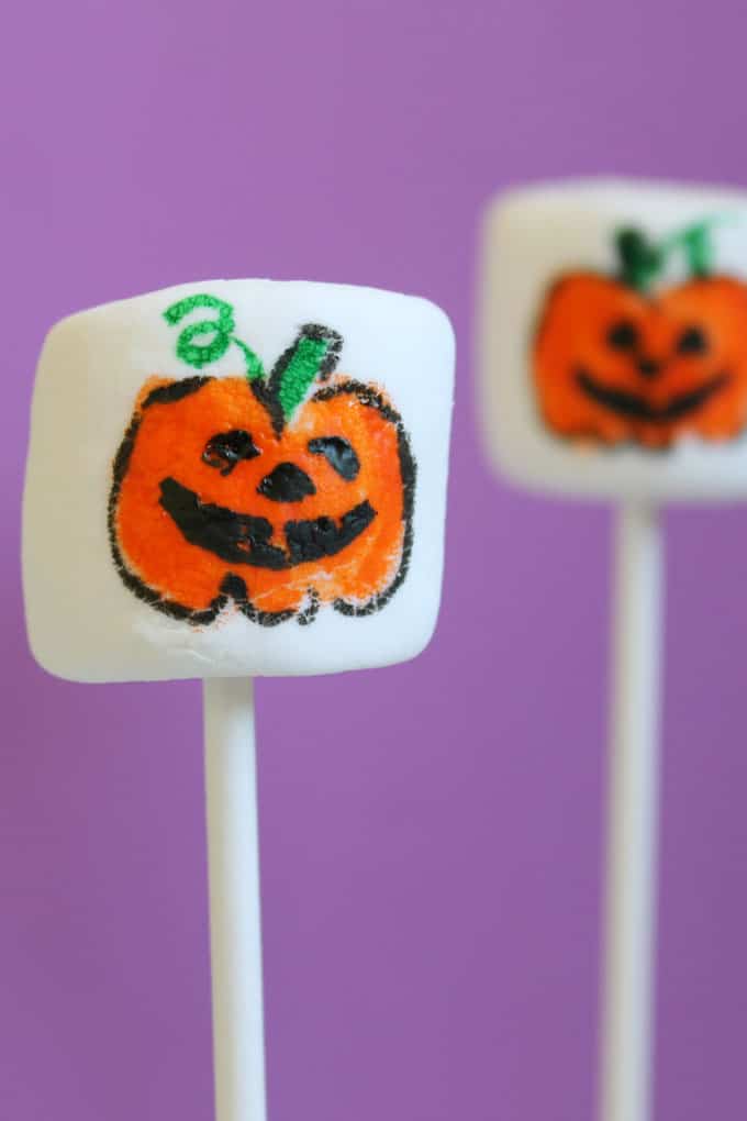 how to draw Halloween Jack O' Lantern marshmallows -- food coloring pens and marshmallows for an easy Halloween treat idea