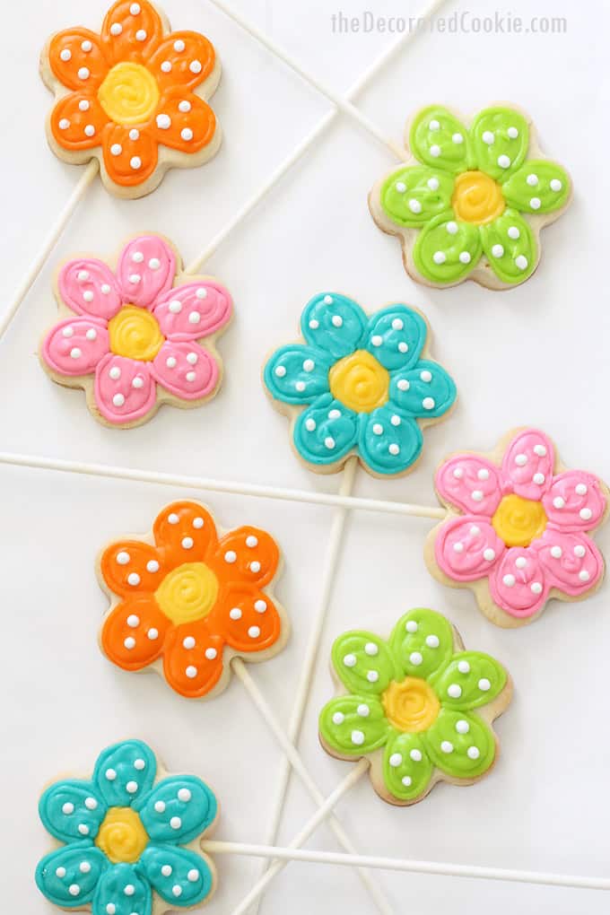 How to make simple POLKA DOT FLOWER COOKIE POPS in an arrangement for Mother's Day or spring. Cut-out sugar cookies on sticks with royal icing.