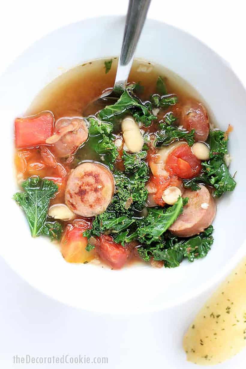 bowl of chicken sausage, kale, and white bean soup 