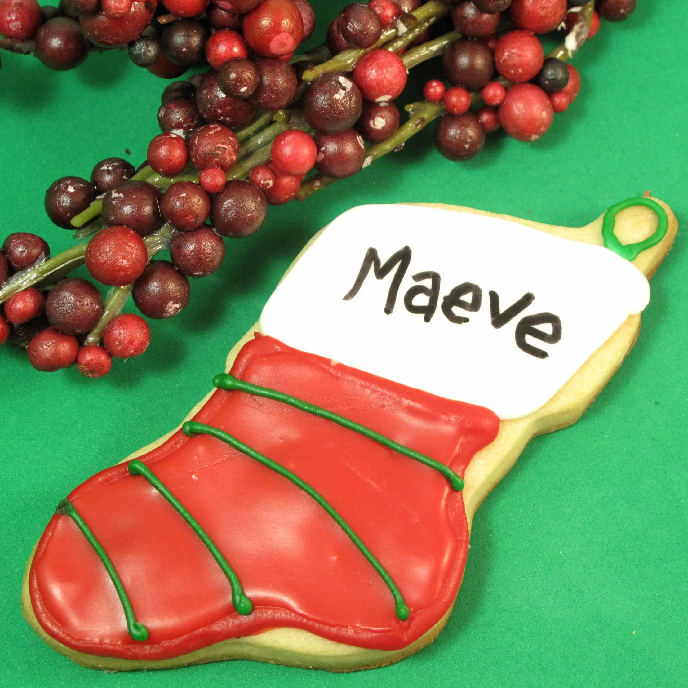 decorating Christmas cookies as stocking cookies personalized with names